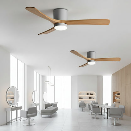 Modern ceiling fans in a stylish interior setting with tables and chairs.