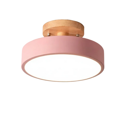 Pink ceiling light fixture with wooden finish on a white background